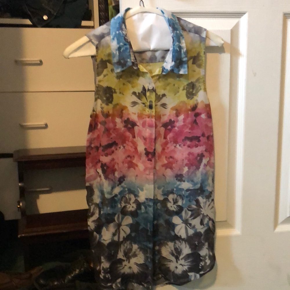 Sleeveless tunic length sleeveless blouse